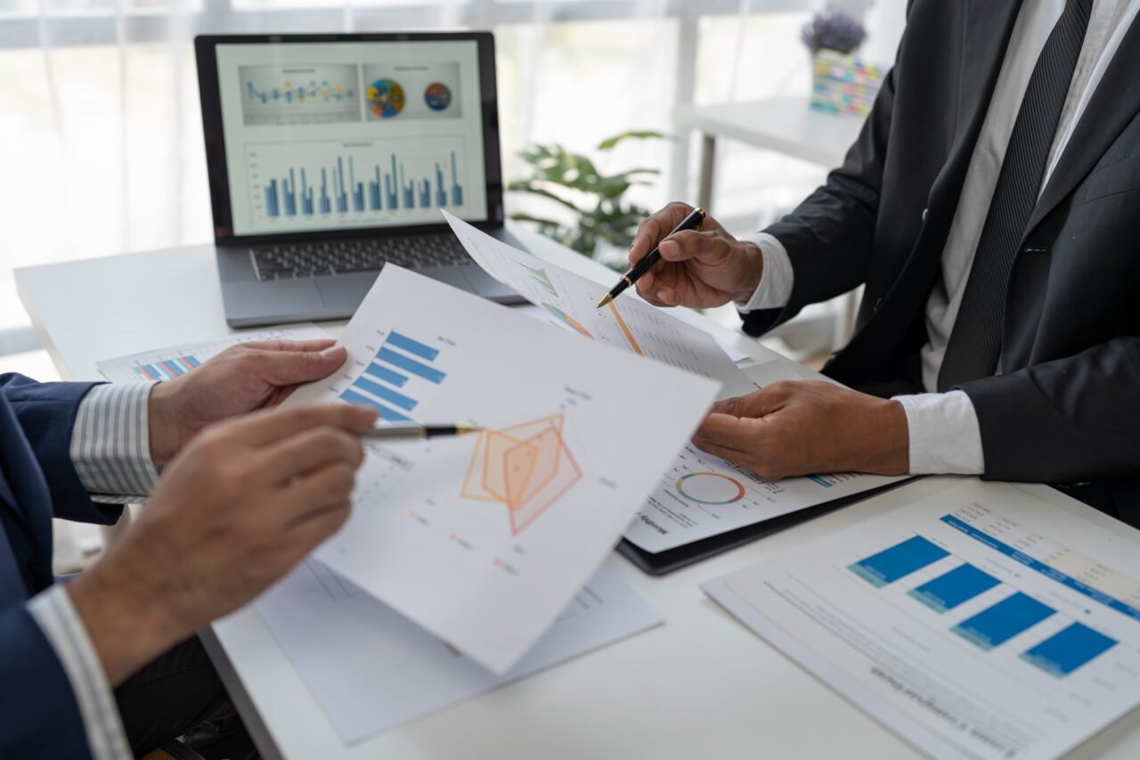 business people meeting in the office Calculate company tax and investment income Strategic planning