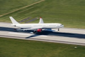 Airplane landing on airport runway
