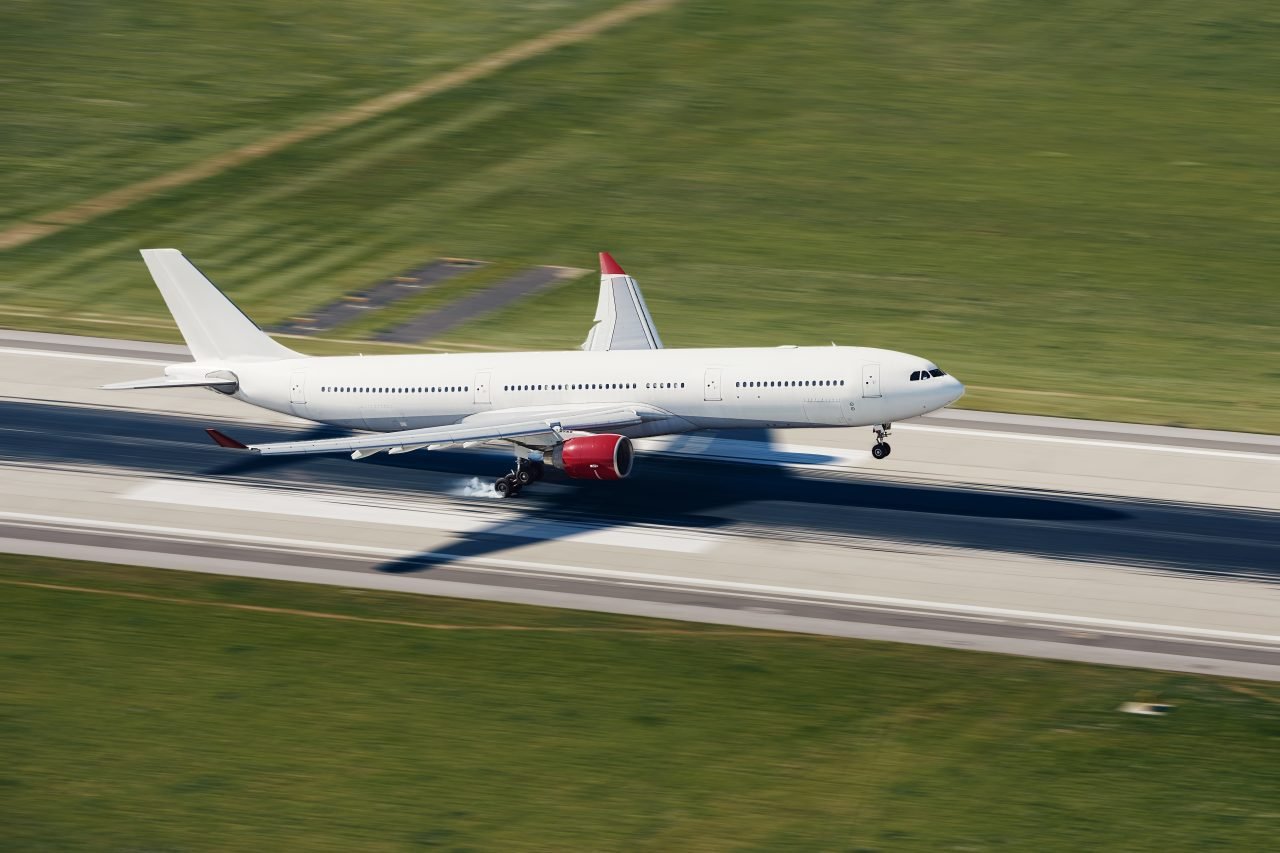 Airplane landing on airport runway