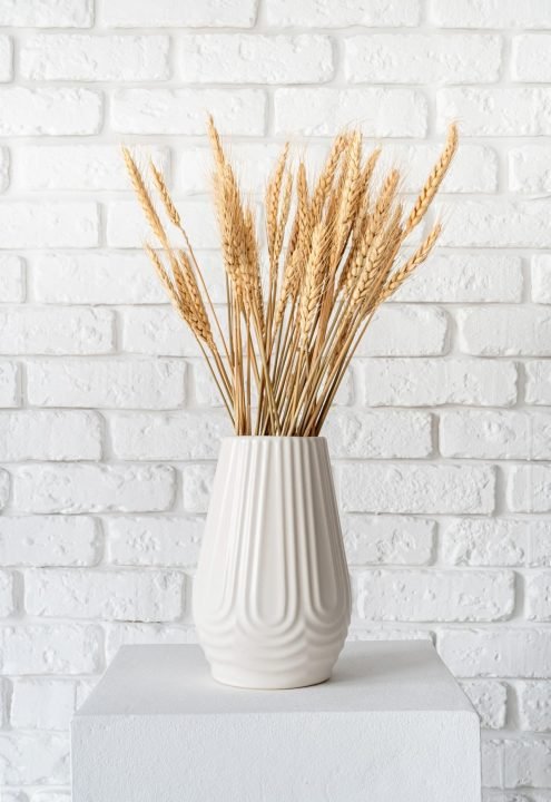 wheat in white vase