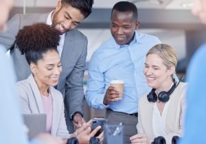 Business people, phone and meeting for teamwork, collaboration and marketing or website design plan