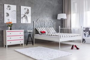 Bedroom with grey wall stucco