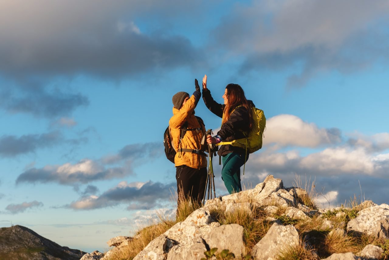 people hiking in the mountains